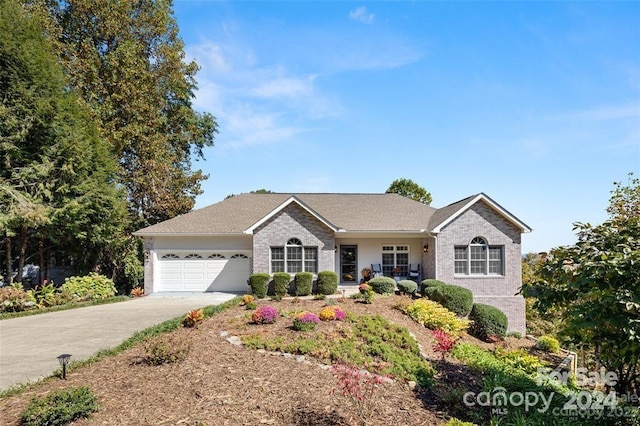 ranch-style home with a garage