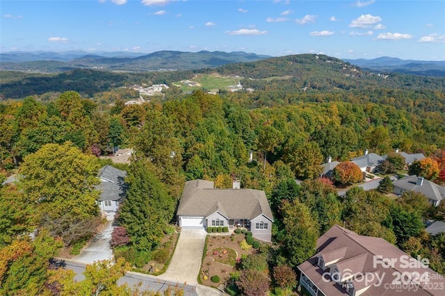 drone / aerial view featuring a mountain view