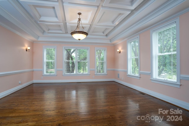 unfurnished room with beamed ceiling, dark hardwood / wood-style flooring, ornamental molding, and coffered ceiling