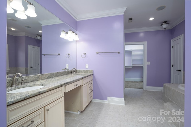 bathroom featuring tile patterned flooring, vanity, and ornamental molding