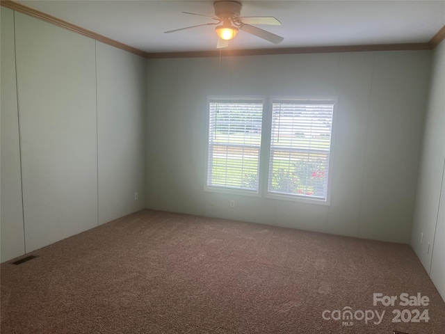 200 Olin Loop, Olin, NC 28660 - carpeted empty room featuring ceiling fan and crown molding