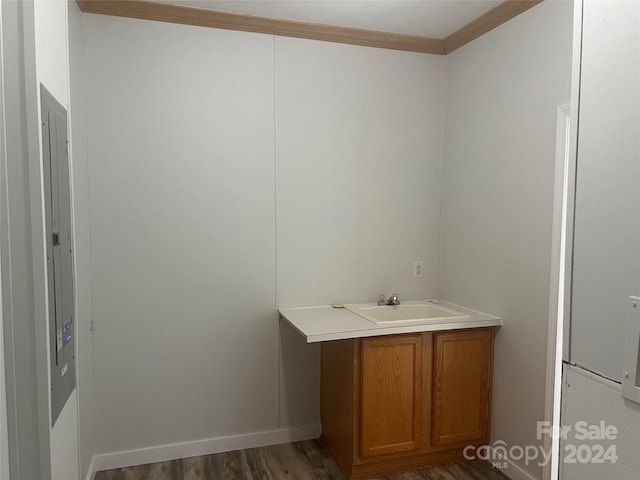200 Olin Loop, Olin, NC 28660 - bathroom featuring vanity, crown molding, and hardwood / wood-style flooring