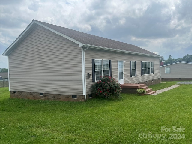 200 Olin Loop, Olin, NC 28660 - view of side of property featuring a yard