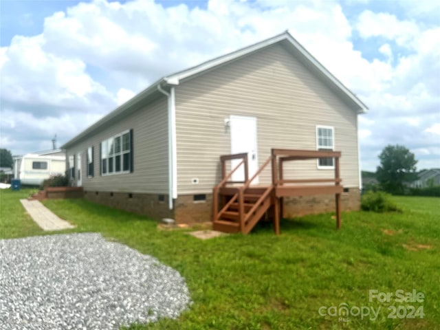 200 Olin Loop, Olin, NC 28660 - back of property with a lawn