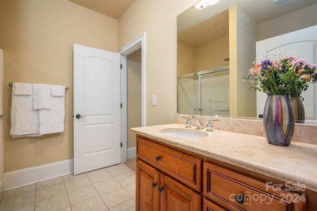 bathroom featuring vanity and tile patterned floors