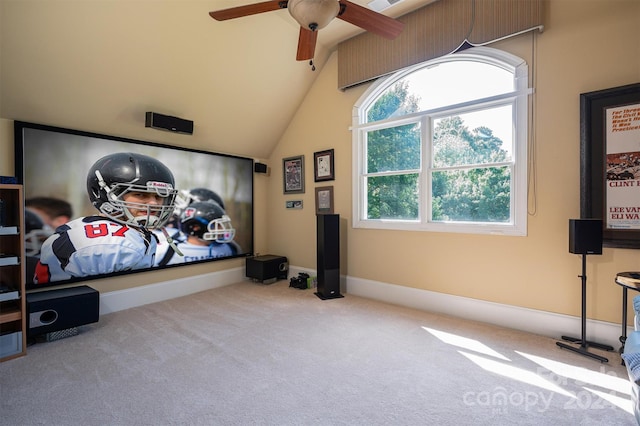 carpeted bedroom featuring ceiling fan and vaulted ceiling