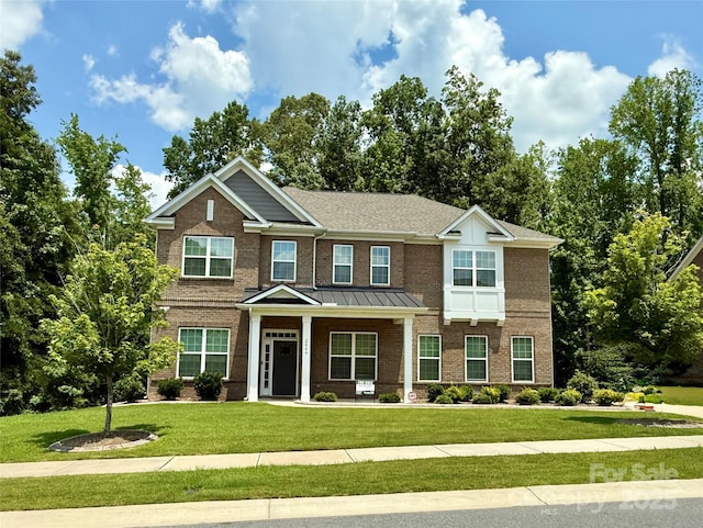 2044 Sweet William Dr, Harrisburg, NC 28075 - view of front of home featuring brick siding and a front yard