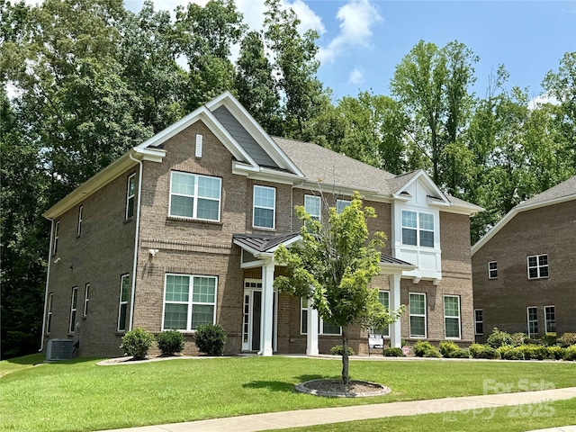 2044 Sweet William Dr, Harrisburg, NC 28075 - view of front of property featuring brick siding and a front yard