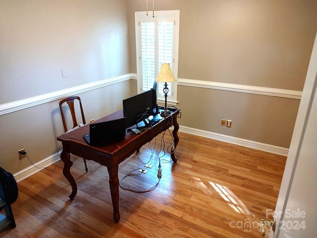 office featuring hardwood / wood-style flooring