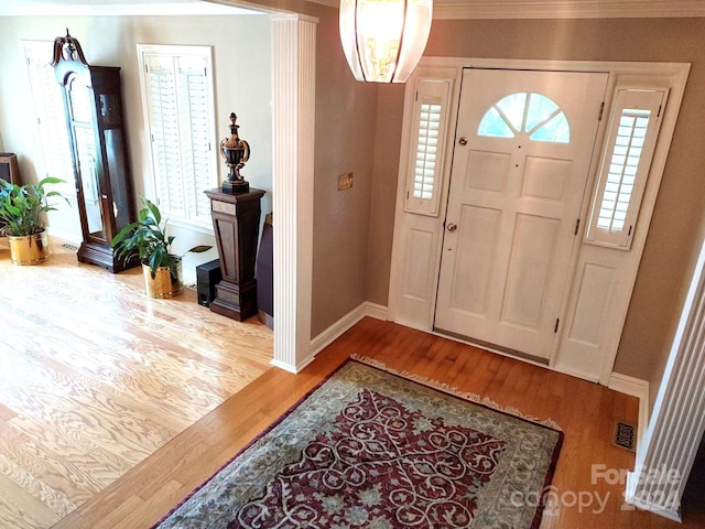 foyer entrance featuring hardwood / wood-style floors