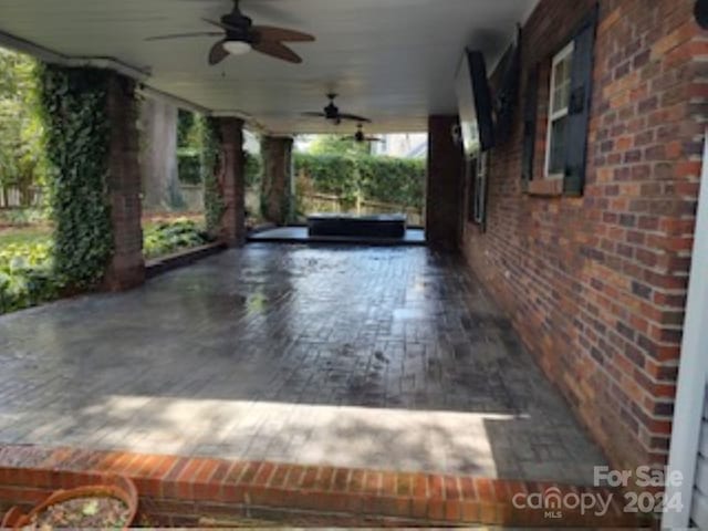 view of patio / terrace featuring ceiling fan