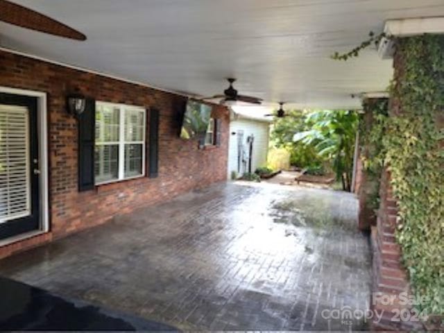 view of patio / terrace featuring ceiling fan