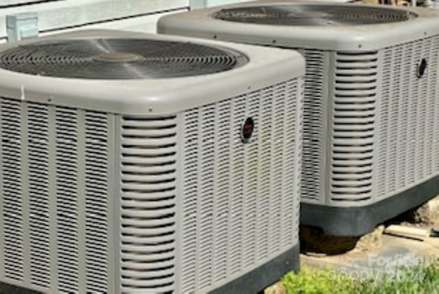 exterior details featuring cooling unit