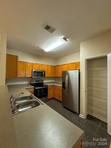 kitchen featuring sink and stainless steel appliances