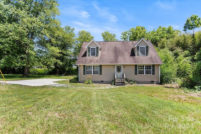 new england style home with a front lawn