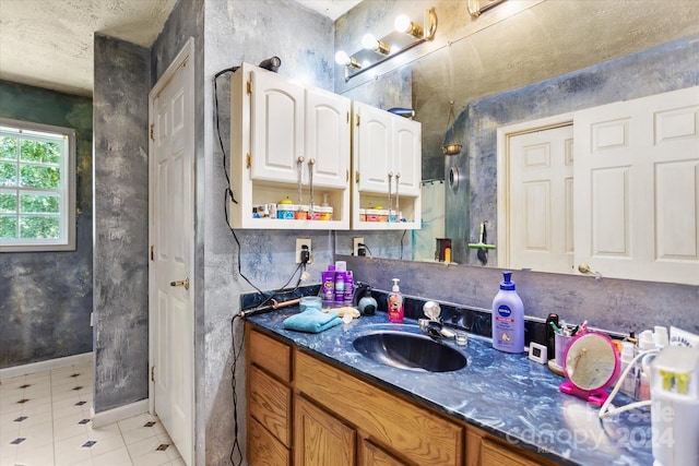 bathroom featuring vanity and tile patterned floors