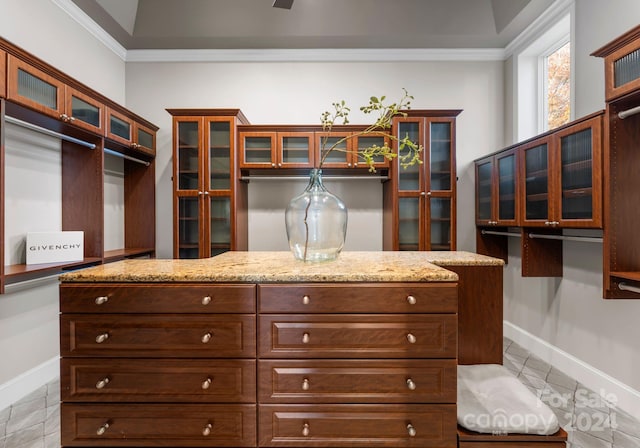 spacious closet featuring light tile patterned flooring