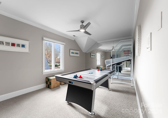 rec room with light colored carpet, ceiling fan, and ornamental molding