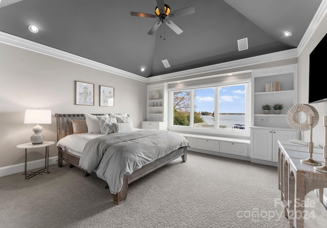 bedroom featuring ceiling fan, lofted ceiling, light carpet, and ornamental molding