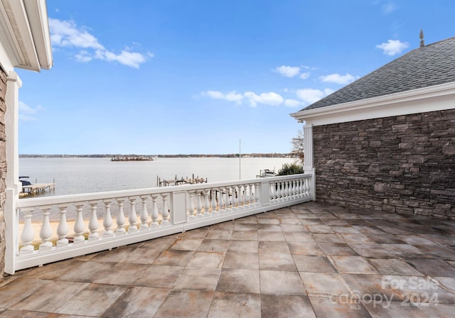 view of patio / terrace with a water view