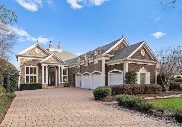 view of front of home with a garage