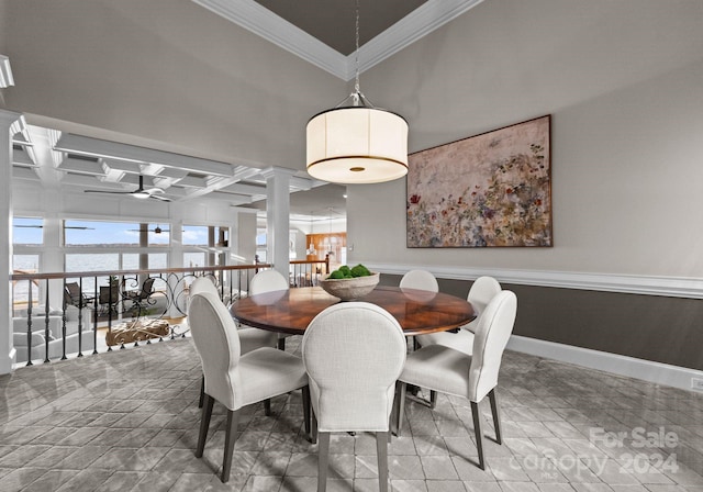 dining room featuring crown molding, beamed ceiling, ceiling fan, and coffered ceiling