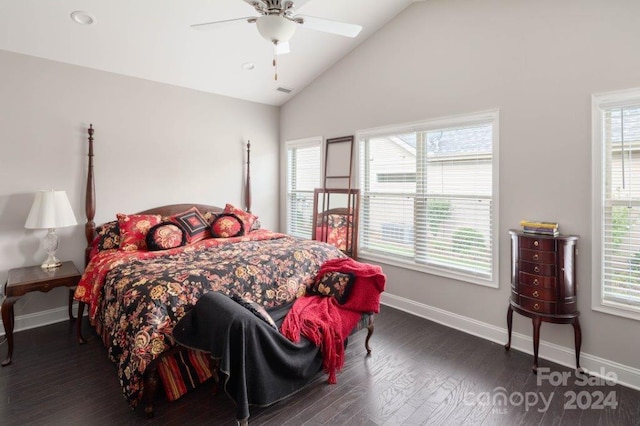 bedroom with vaulted ceiling, ceiling fan, and dark wood-type flooring