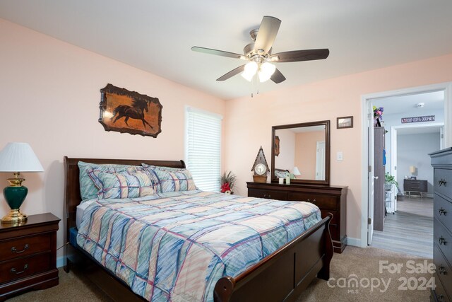 bedroom with carpet and ceiling fan