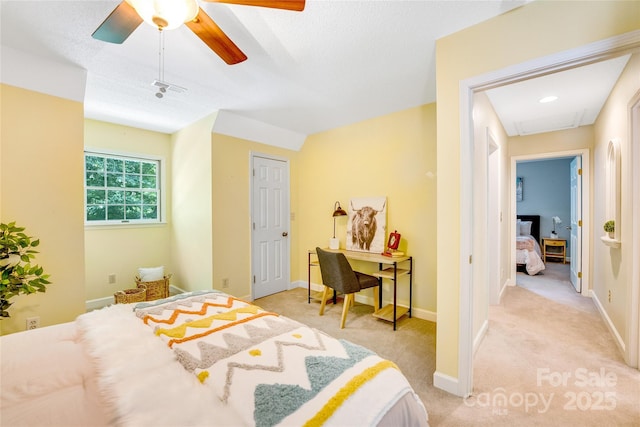 bedroom with light colored carpet and ceiling fan