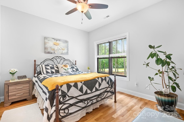 bedroom featuring ceiling fan and light wood-type flooring