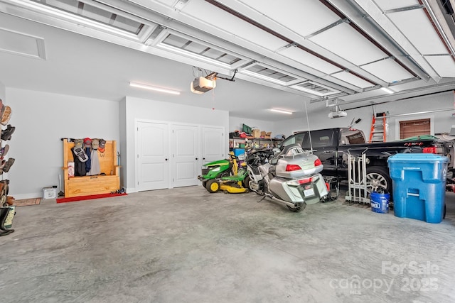 garage featuring a garage door opener