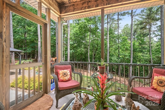 sunroom / solarium featuring a wealth of natural light