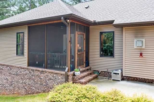 exterior space featuring a sunroom