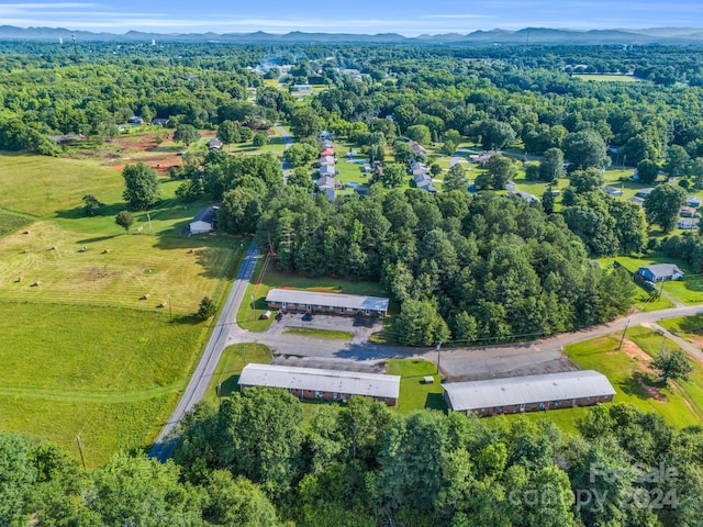 drone / aerial view featuring a mountain view