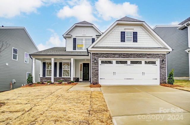 craftsman inspired home featuring a garage