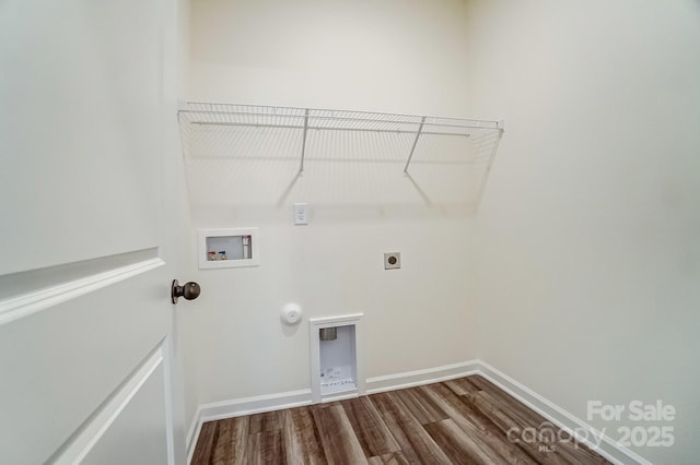 washroom featuring gas dryer hookup, washer hookup, hookup for an electric dryer, and hardwood / wood-style flooring