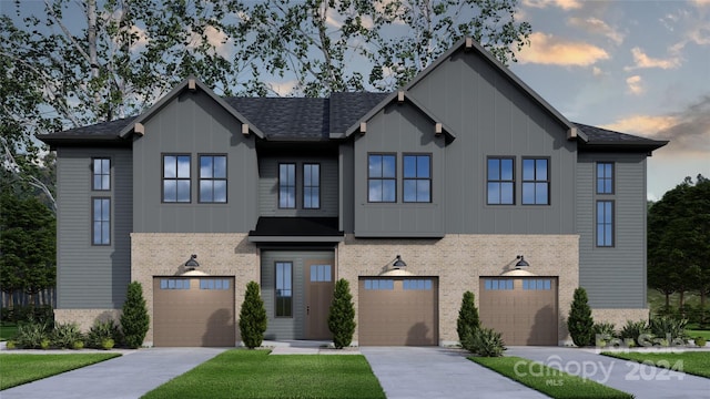 view of front of home with a garage