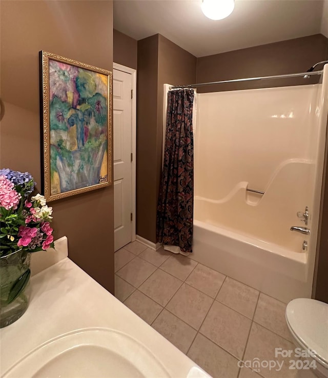 full bathroom featuring toilet, tile patterned flooring, shower / bath combo, and vanity