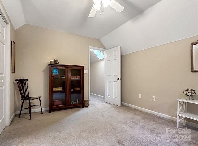 additional living space with ceiling fan, lofted ceiling, and light colored carpet