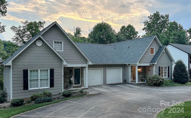 view of front of property with a garage