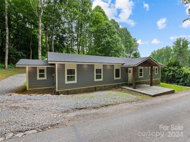 single story home with a patio