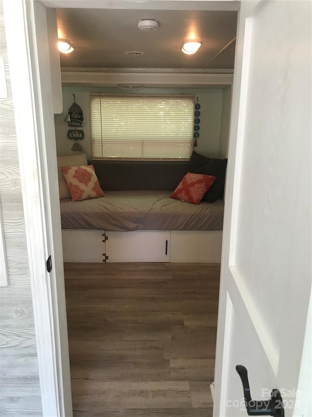 bedroom featuring hardwood / wood-style floors