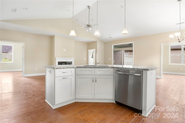 kitchen with white cabinets, dishwasher, a center island with sink, and hanging light fixtures