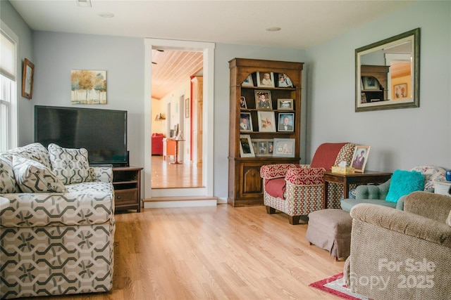 living area with wood finished floors