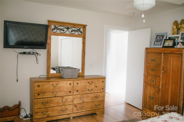 bedroom featuring wood finished floors