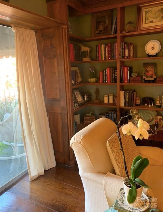 sitting room featuring wood-type flooring