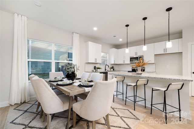 dining area featuring light hardwood / wood-style floors