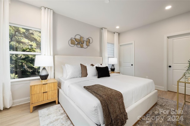 bedroom featuring light hardwood / wood-style floors