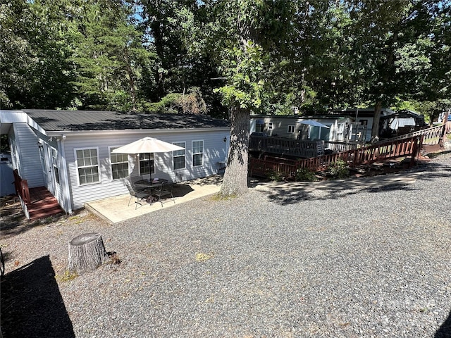 view of front of home featuring a patio