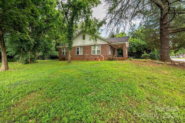 single story home featuring a front lawn